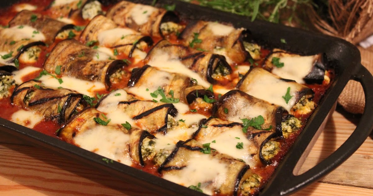 Rollitos de berenjena con queso y espinacas